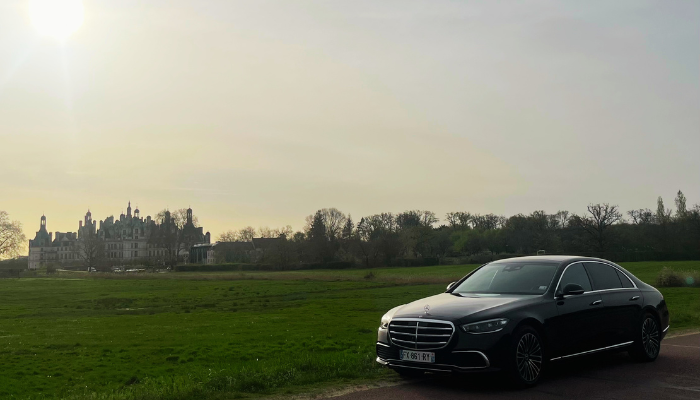 rent a luxury car with a private chauffeur car driven from paris to loire valley castles chateau de chambord driver